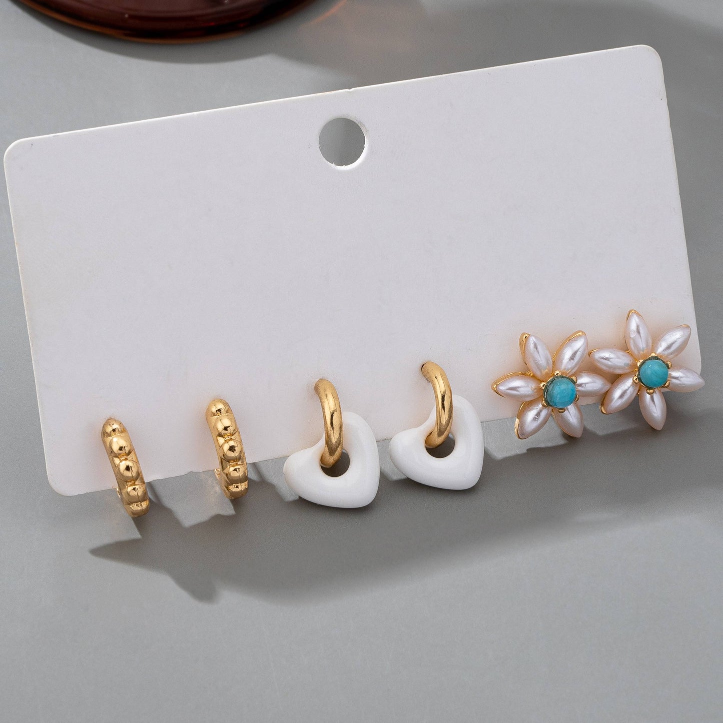 HUGGIE HOOP FLORAL TRIO EARRINGS 80E61540