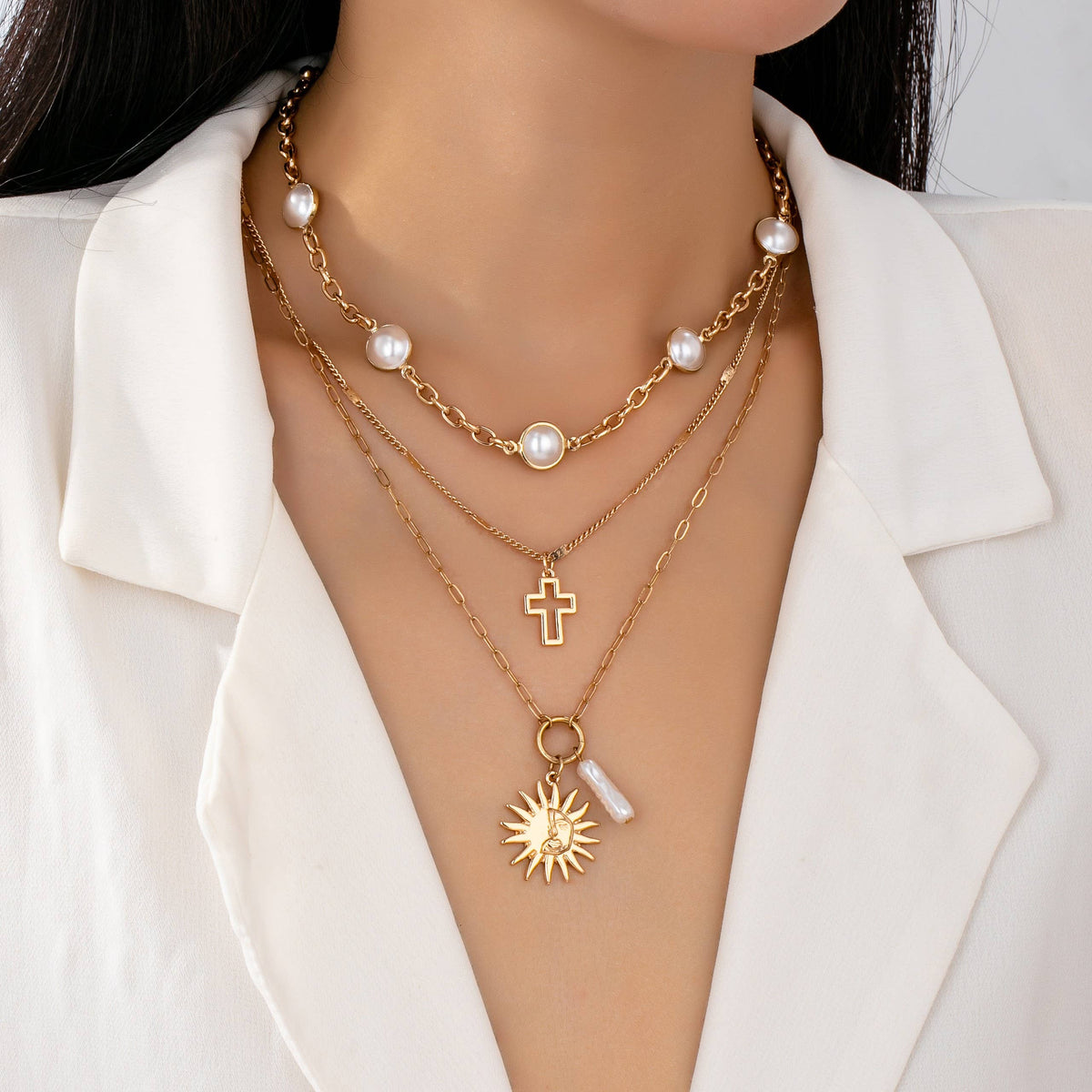 MULTI PEARL LAYER PEARL SUN CROSS CHARM NECKLACE | 80N92503
