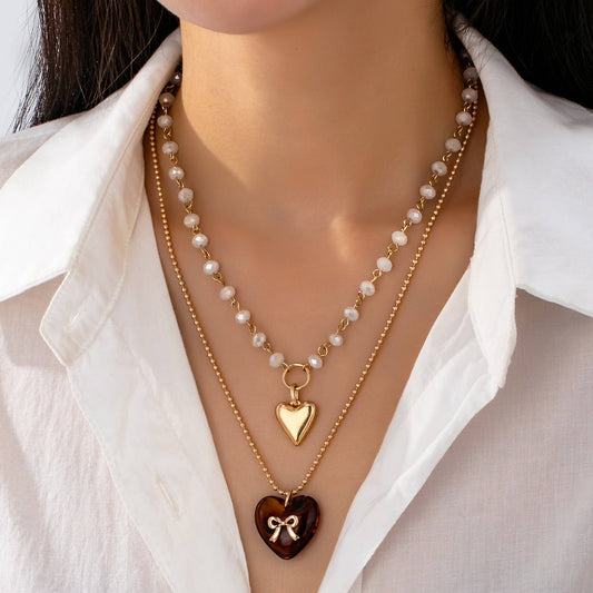MULTI LAYER DOUBLE HEART CHARM NECKLACE | 80N92656