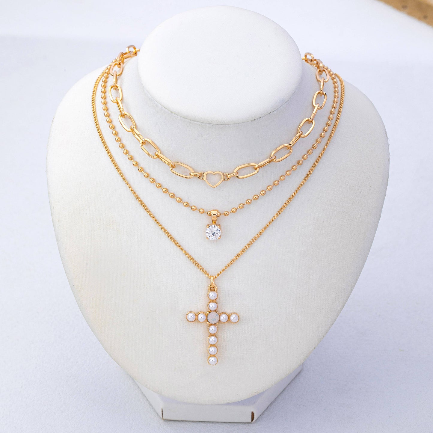 Multi-Layered Pearl Cross Rhinestone Necklace | 80N93577