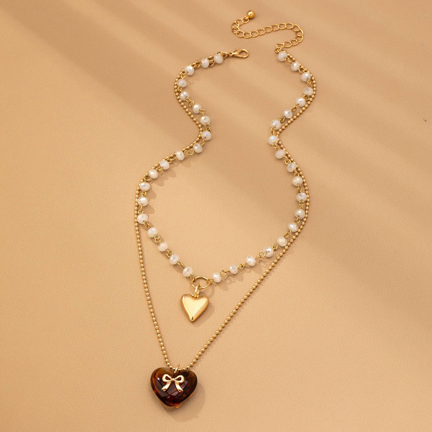 MULTI LAYER DOUBLE HEART CHARM NECKLACE | 80N92656